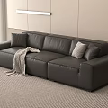 Black Leather Three Seater Sofa With Throw Pillows And Knit Blanket In Modern Living Room