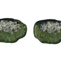 Outdoor Garden Ornaments With Decorative Stone Stacked Structures And Green Bases
