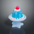 Blue Jelly Dessert With White Cream Topping And Cherry On Star Shaped Plate