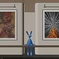 Two Abstract Paintings Hanging On Wall With Blue Rabbit Sculpture In Modern Interior