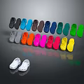 Colorful Clogs In Various Vibrant Hues Arranged Neatly With Reflection