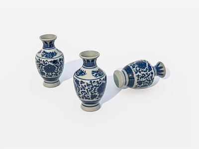 Traditional Blue and White Ceramic Vases with Intricate Floral Patterns Standing and Lying 3d model
