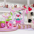 Vibrant Shopping Mall Photo Check in Spot Featuring Pink Cartoon Character Balloons And Hearts