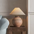 Terracotta Table Lamp With Decorative Patterns On Wooden Side Table By Light Blue Sofa 3d model