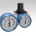 Industrial Equipment Featuring Dual Blue Pressure Gauges And Central Black Component