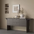 Stylish Gray Console Table With Drawers Topped With Decorative Vase Dried Branches And Wall Art