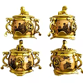 Four Piece Golden Ornament Decor Set With Intricate Carved Patterns And Figurine Topped Lids