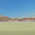 Mediterranean Style Commercial Complex With Red Roof Multiple Connected Buildings Open Front Area Blue Sky