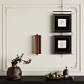 White Wall Decor With Two Black Framed Paintings Wall Sconce And Vase 3d model
