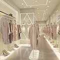 Modern Clothing Store Interior With Clothes On Racks Mannequins And Shoes