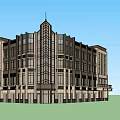 Modern Commercial Complex Featuring Multi story Structure Large Glass Windows And Symmetrical Spire