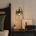 Modern Glass Table Lamp on Bedroom Nightstand with Astronaut Figurine and Radio