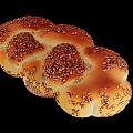 Freshly Baked Golden Braided Bread Topped With Sesame Seeds On Black Background