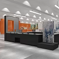 Modern Exhibition Hall Interior With Black Reception Desk Orange Accent Wall Artworks And Linear Pendant Lights