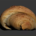 Golden Crispy Freshly Baked Croissant With Flaky Interior Shiny Crust On Black Reflective Surface