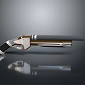 Shiny Revolver With Silver And Gold Metal Parts Black Barrel And Reflective Grip
