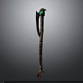 Ornate Ancient Weapon With Long Red Brown Handle And Green Gemstone Adorned Head