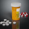 Yellow Pill Bottle With White Cap And Scattered White Pills Red And White Capsules