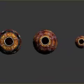 Carved Glass Vases in Red and Orange Patterns with Various Sizes on Black Background