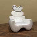 Cute Purple Single Chair With Rabbit Ears Design On Wooden Floor And Beige Wall