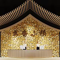 Book Art Inspired Reception Design With Wooden Structure And Stone Wall