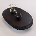 Oval Dark Wood Coffee Table With Vase Dried Flowers And Small Bowl