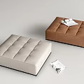 Beige and Brown Tufted Upholstered Ottoman Footstool with Magazine on Light Background