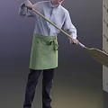 Man Wearing Light Blue Shirt And Green Apron Holding Broom For Indoor Cleaning