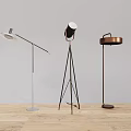 Modern Floor Lamps With Various Designs And Metal Bases On Wooden Floor