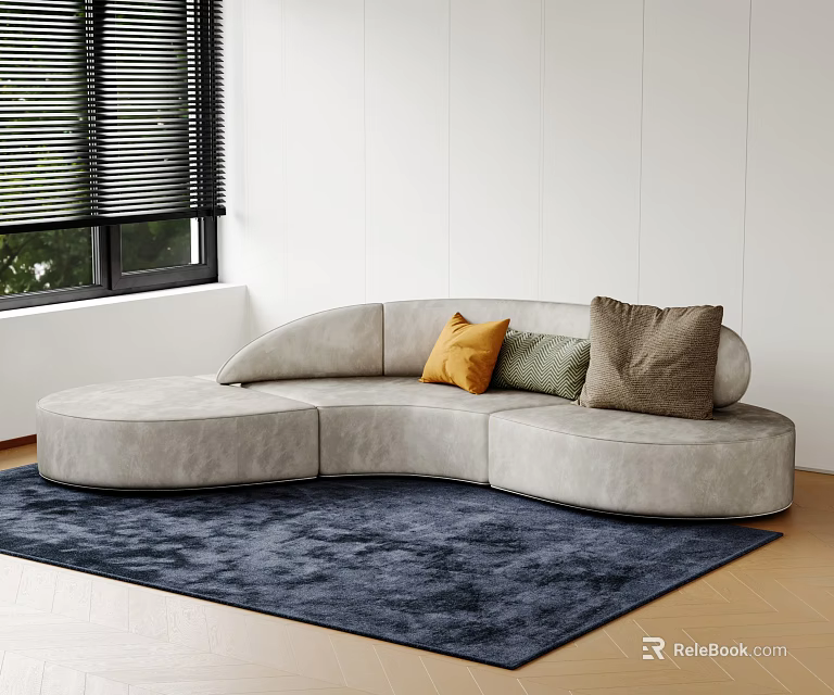 Irregular Shaped Light Gray Sofa Curved With Orange Green Brown Throw Pillows On Blue Rug 3d model 