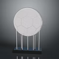 Modern Round Accent Table With Geometric Pattern And Slender Legs On Black Base