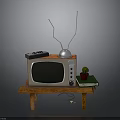 Vintage TV With Antenna On Wooden Table Remote Control Potted Plant And Books