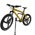Yellow Mountain Bicycle Mounted On Repair Stand With Large Off Road Tires