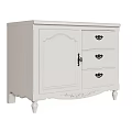 White Decorative Cabinet With Carved Design Drawers Black Handles And Carved Legs