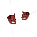 Two Red Devil Masks With Horns And Yellow Eyes As Decorative Ornaments