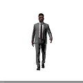 Full length man in gray suit with pink tie walking on black background