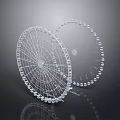 Two Transparent Circular Mesh Structures With Ring Edges On Dark Background