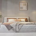 Stylish Double Bed with Plush Pillows and Knitted Blanket Near Nightstands and Decorative Painting