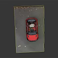 Red Convertible Toy Car With Steering Wheel Inspired By Land Rover On Green Mossy Ground