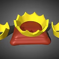Three Golden Decorative Crown Jewelry Pieces with Central Red Base