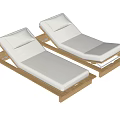 Two Outdoor Lounge Chairs With White Cushions And Wooden Frames