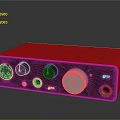 Red And Black Electronic Audio Device With Control Knobs And Input Ports