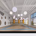 Bright Fitness Training Studio With Yellow Punching Bags Blue Mats And Round Ceiling Lights