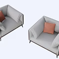 Stylish Modern Single Seater Sofa With Light Gray Upholstery Brown Trim And Orange Pillows