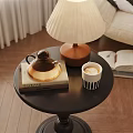 Black Coffee Table With Teapot Book Coffee Cup And Table Lamp Near Beige Sofa
