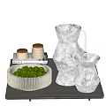 Inflatable Home Decor Products Including Vase Bowl With Limes Cups And Books Displayed