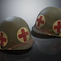 Two Old Military Green Helmets Featuring Red Cross Symbols On Surface 3d model