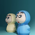Two Yellow and Blue Dolls in Hooded Outfits with Surprised Expressions