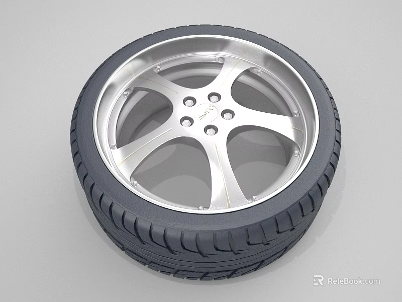 Stylish Car Tire With Silver Five Spoke Alloy Wheel And Tread Pattern 3d model