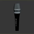 Sleek Handheld Microphone Electronic Device With Black Body Silver Mesh Grill And Metallic Ring